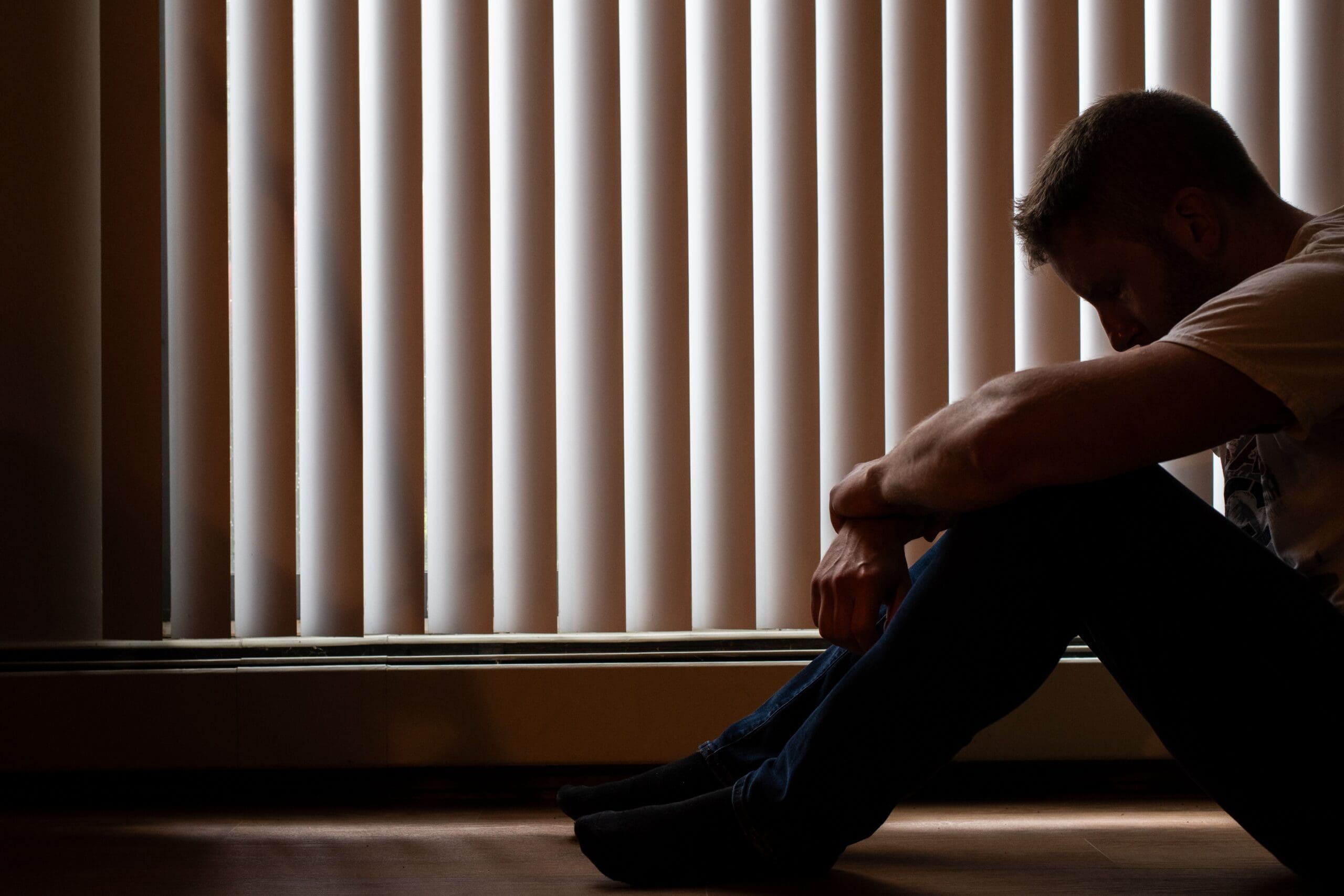 Man sitting depressed
